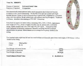 PLATINUM RUBY AND DIAMOND BRACELET. TOTAL ESTIMATED RETAIL VALUE: $20,450.00. MINIMUM RESERVED BID: $3,000.00