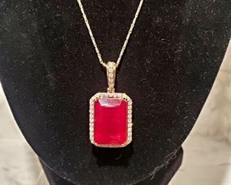 14KT YELLOW GOLD RUBY AND DIAMONDS NECKLACE. TOTAL RETAIL VALUE: $6,000.00. MINIMUM RESERVED BID: $850.00.