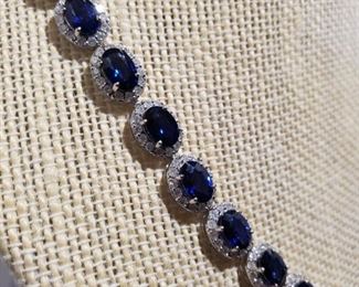 14KT WHITE GOLD SAPPHIRE AND DIAMOND NECKLACE. EXCELLENT WORKMANSHIP.            34.75 ct. In colored stones.
7.95 ct. In diamonds.
Total estimated retail value: $30,200.00
Minimum Reserved bid: $3,850.00