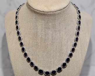 14KT WHITE GOLD SAPPHIRE AND DIAMOND NECKLACE. EXCELLENT WORKMANSHIP.            34.75 ct. In colored stones.
7.95 ct. In diamonds.
Total estimated retail value: $30,200.00
Minimum Reserved bid: $3,850.00