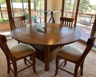 Haverty's Sonoma Valley Gathering Table with six (6) Slat Back Barstools
• Gathering Table 46" x 46" x 36", expandable to 60" round x 36"
• QTY of six (6) 24" Slat Back Barstool 20" x 18" x 42"