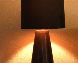 Set of two (2) copper based lamps.