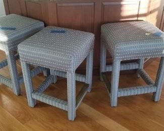Three upholstered bar stools available