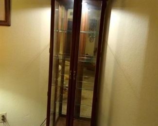 Curio Cabinet by Reinisch with lights mirror and 4 adjustable shelves
25"w x 72"tall x 12" deep