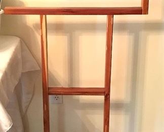 Hand crafted quilt rack with sewing machine embellishment 