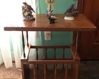 Hand crafted accent table with magazine holder base