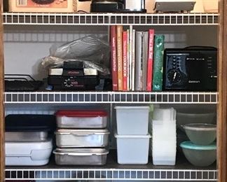 Small appliances, Tupperware, bakeware, cookbooks and other various kitchenware 