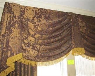 Dining room custom drapes in a lush fabric with fringe.