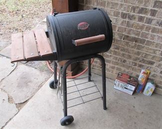 Charcoal Grill w/ supplies inside.