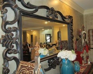 A lovely large mirror in a beautiful frame