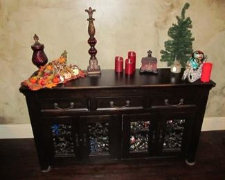 A rustic console w/ decorative metalwork. Perfect for your entertainment system, office, foyer, or dining room!