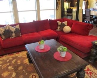 Plenty of seating on this Cindy Crawford Home sectional sofa in scarlet red.