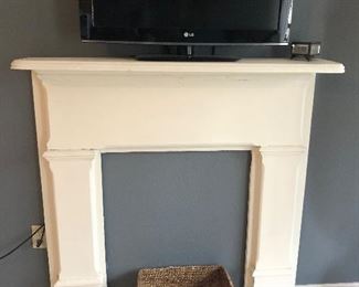 Antique fireplace mantel for that faux fireplace for a TV look 