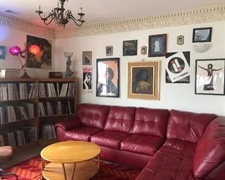 Couch, furniture, and artwork are all for sale.