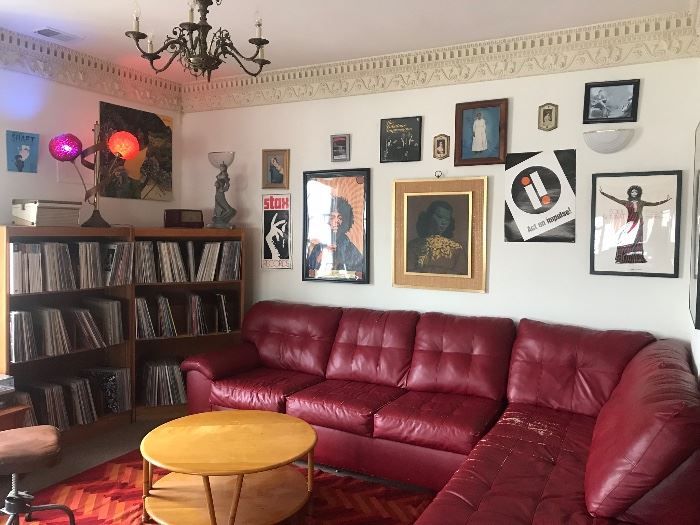 Couch, furniture, and artwork are all for sale.