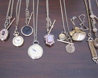 Dozens of Antique Watch Fobs & Pendant Watches.