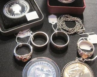 Silver Coins and Rings.