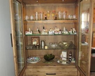 Dining Room Hutch with glass shelves and lights, lighthouse collection, hand painted trinkets/bowls, glassware, and more