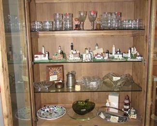 Dining Room Hutch with glass shelves and lights, lighthouse collection, hand painted trinkets/bowls, glassware, and more