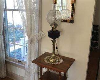antique oil lamp, mirror and stand