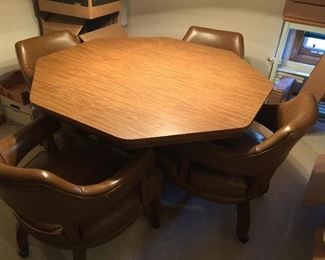 Octagonal Dinner Or Game Table with 4 Leather chairs on Rollers