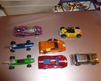 Found 7 Redline Hotwheels in the case..nice, but played with condition. Pic of case, which is like new, is next,