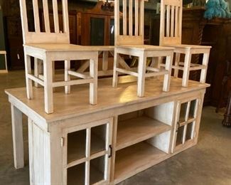 dining island table with 3 chiars and bench