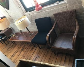 Wicker chair, wool and teak chair, Lane coffee table (as is), Lightolier lamp, wire book rack, midcentury walnut lamp 