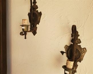 Many lamps, sconces and chandeliers.