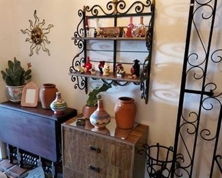 Antique gate leg table.  Lots of figurines.