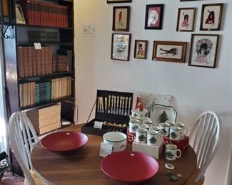 Quarter sawn oak signed Stickley dining table.   Books, Di Grazia pictures.  Spode "Christmas Tree" dishes.   
