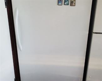 Frigidaire upright freezer.