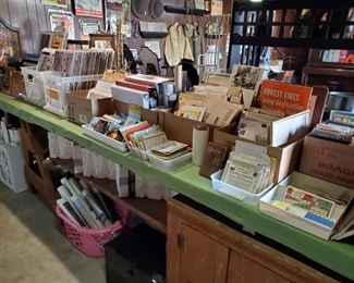 Lots of ephemera, with paper, magazines, photo's, postcards, posters & more.