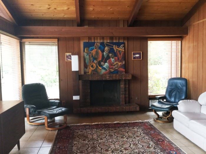 The real Ekornes Chair is on the right. Check out the killer fireplace tile