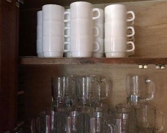 Lots of beer mugs and coffee mugs 