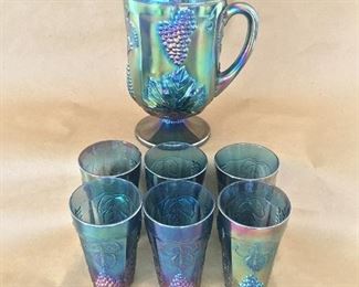 Carnival glass pitcher and tumbler set