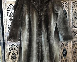 fur coat needs repair