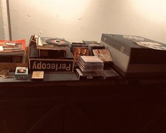 Records c d and record player