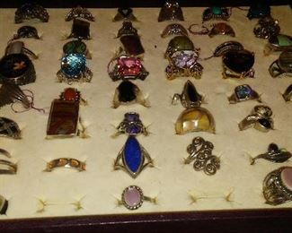 Collection of sterling silver rings with mounted semi precious stones