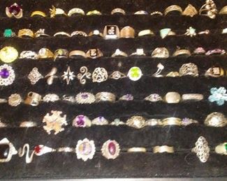 Collection of sterling silver rings with mounted semi precious stones