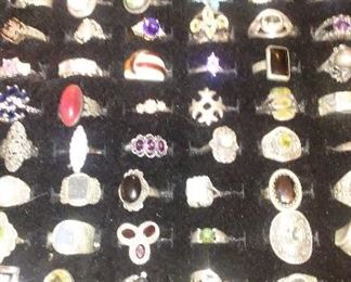 Collection of sterling silver rings with mounted semi precious stones