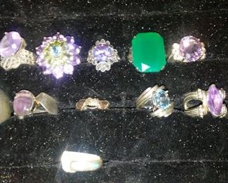 Collection of sterling silver rings with mounted semi precious stones
