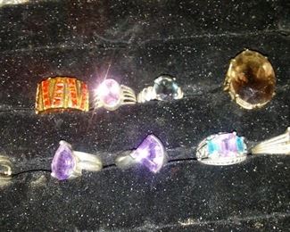 Collection of sterling silver rings with mounted semi precious stones