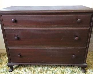 Antique ribbon mahogany chest of drawers