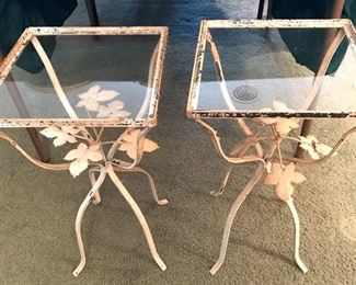 Pair of small glass top wrought iron tables