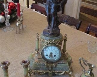 antique English clock with candlesticks