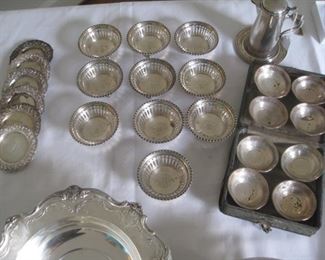 Sterling nut dishes, coasters, salts