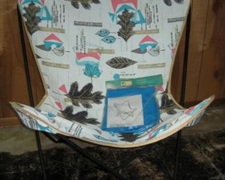 Butterfly chair with extra new cover. 