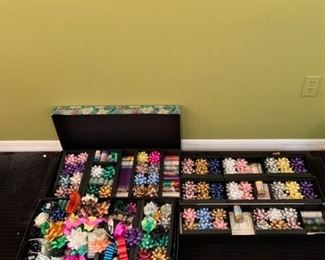 Assorted wrapping paper, tissue, and bows https://ctbids.com/#!/description/share/293084