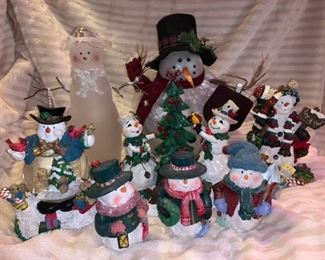 Snowman Collection ..The big one in the black hat lights up..$25 all the others are $4